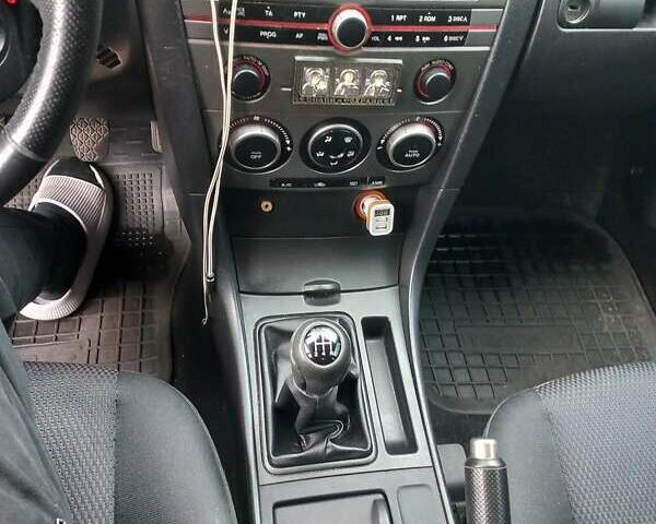 Мазда 3 2006 у Житомирі на Automoto.ua Чорний Мазда 3, об'ємом двигуна 1.6 л та пробігом 198 тис. км за 4400 $, фото 22 на Automoto.ua