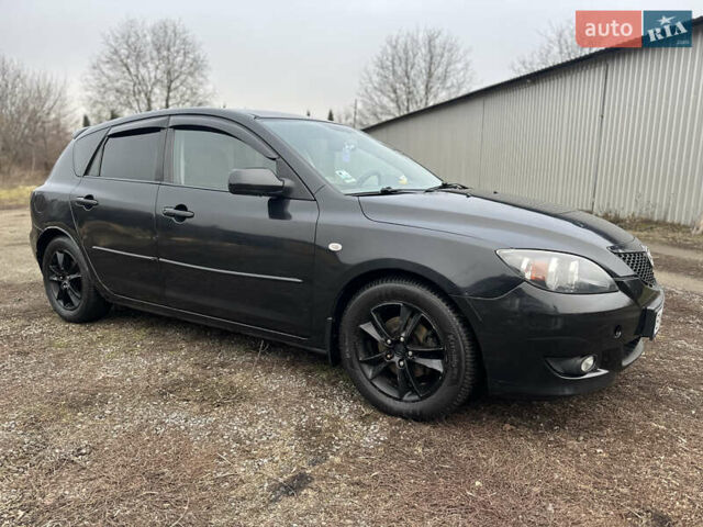 Чорний Мазда 3, об'ємом двигуна 1.6 л та пробігом 272 тис. км за 3999 $, фото 2 на Automoto.ua