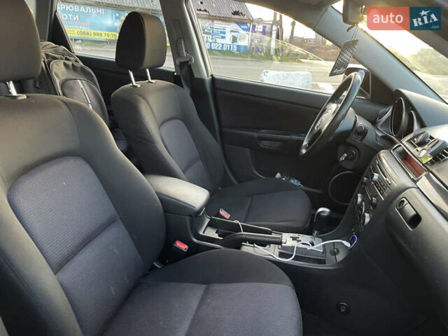 Черный Мазда 3, объемом двигателя 1.6 л и пробегом 360 тыс. км за 4600 $, фото 23 на Automoto.ua