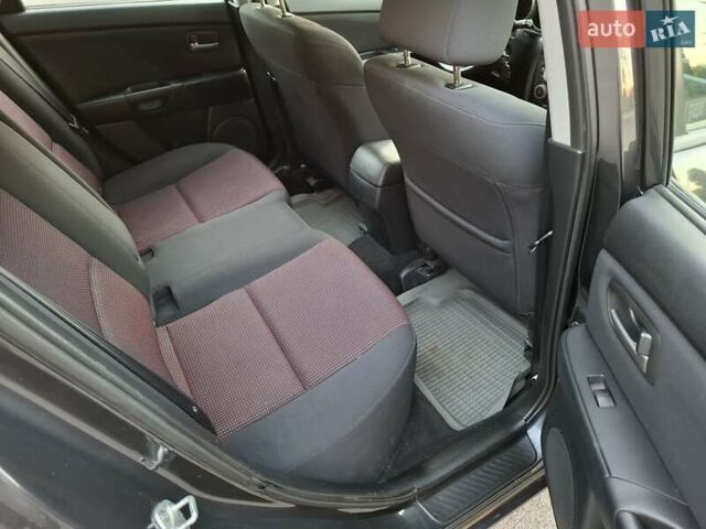 Черный Мазда 3, объемом двигателя 1.6 л и пробегом 193 тыс. км за 4999 $, фото 16 на Automoto.ua