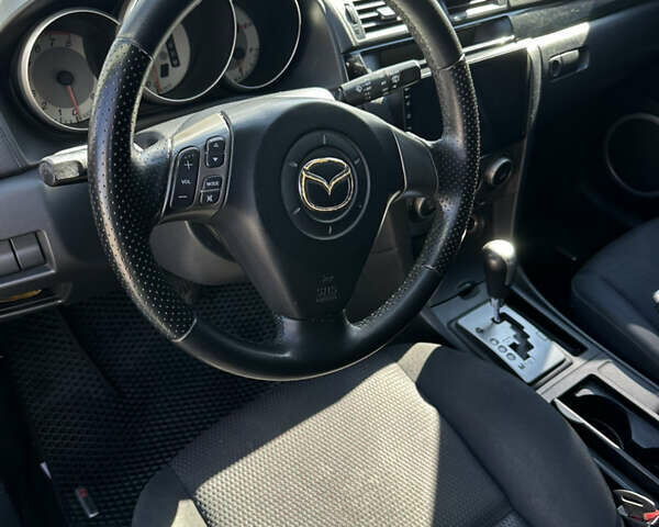 Чорний Мазда 3, об'ємом двигуна 1.6 л та пробігом 236 тис. км за 4555 $, фото 8 на Automoto.ua