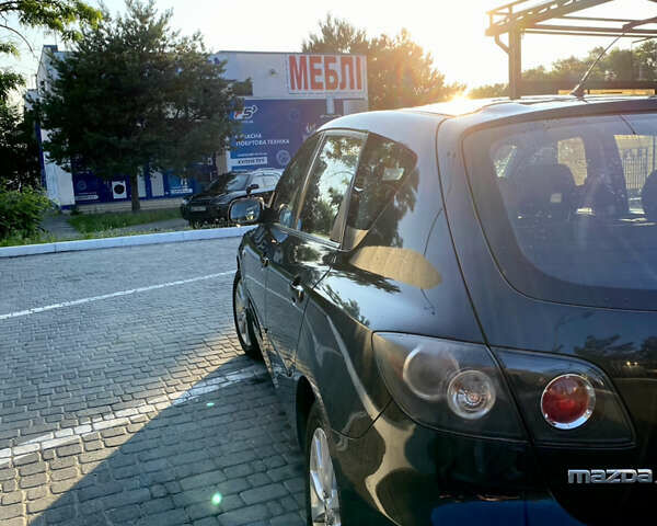 Черный Мазда 3, объемом двигателя 1.6 л и пробегом 218 тыс. км за 5600 $, фото 2 на Automoto.ua