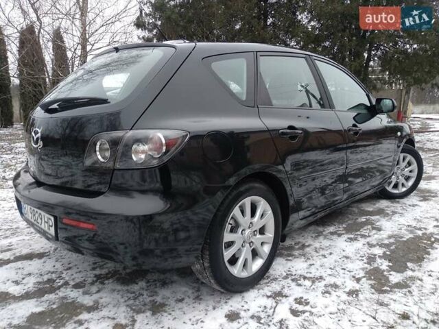 Черный Мазда 3, объемом двигателя 1.6 л и пробегом 134 тыс. км за 5600 $, фото 4 на Automoto.ua