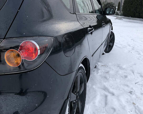 Черный Мазда 3, объемом двигателя 1.6 л и пробегом 296 тыс. км за 4499 $, фото 9 на Automoto.ua