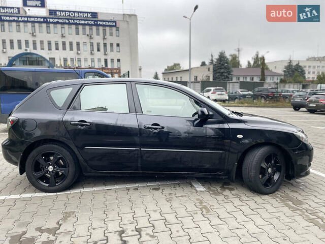 Черный Мазда 3, объемом двигателя 1.6 л и пробегом 146 тыс. км за 5499 $, фото 7 на Automoto.ua