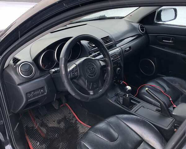 Черный Мазда 3, объемом двигателя 1.6 л и пробегом 296 тыс. км за 4499 $, фото 12 на Automoto.ua