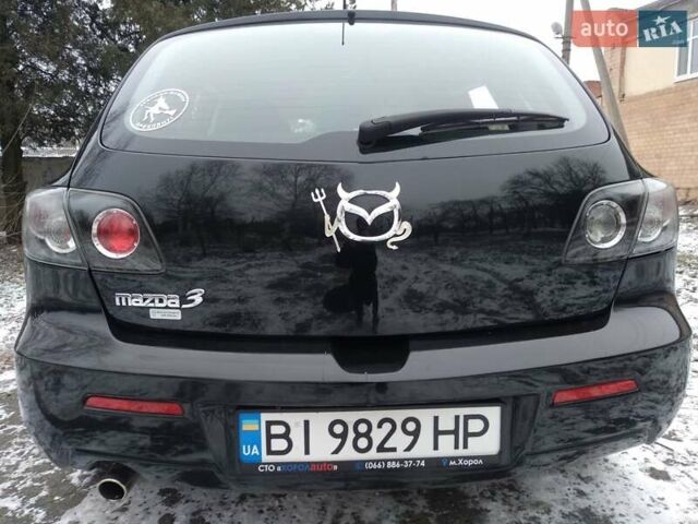 Черный Мазда 3, объемом двигателя 1.6 л и пробегом 134 тыс. км за 5900 $, фото 3 на Automoto.ua