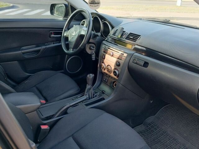 Чорний Мазда 3, об'ємом двигуна 1.6 л та пробігом 330 тис. км за 4500 $, фото 4 на Automoto.ua