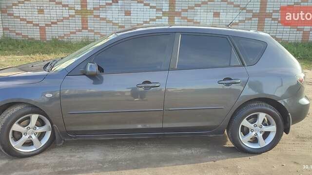 Чорний Мазда 3, об'ємом двигуна 1.6 л та пробігом 316 тис. км за 4300 $, фото 19 на Automoto.ua