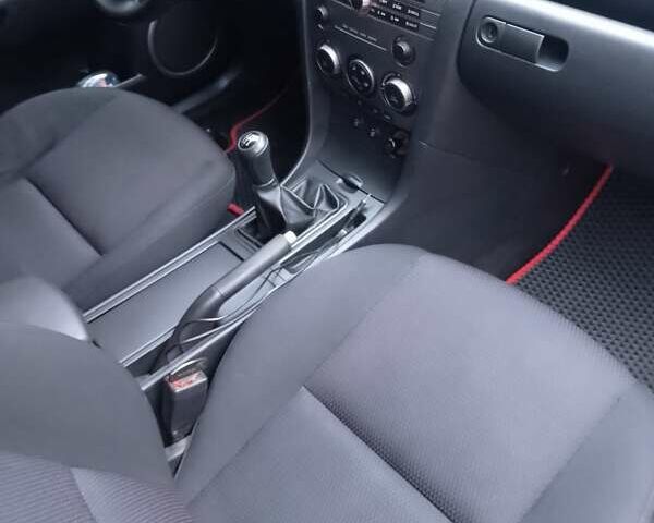 Чорний Мазда 3, об'ємом двигуна 1.6 л та пробігом 207 тис. км за 5200 $, фото 6 на Automoto.ua