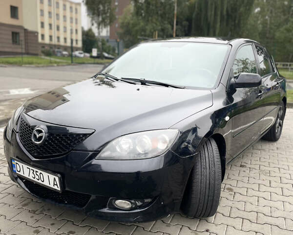 Черный Мазда 3, объемом двигателя 1.6 л и пробегом 146 тыс. км за 5499 $, фото 2 на Automoto.ua