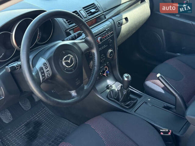 Черный Мазда 3, объемом двигателя 1.6 л и пробегом 192 тыс. км за 5700 $, фото 6 на Automoto.ua