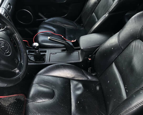 Черный Мазда 3, объемом двигателя 1.6 л и пробегом 296 тыс. км за 4499 $, фото 14 на Automoto.ua