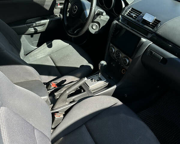Чорний Мазда 3, об'ємом двигуна 1.6 л та пробігом 236 тис. км за 4555 $, фото 5 на Automoto.ua
