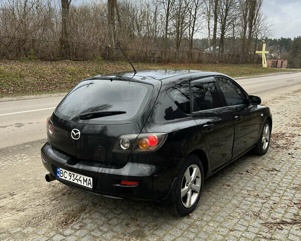 Черный Мазда 3, объемом двигателя 1.6 л и пробегом 260 тыс. км за 3250 $, фото 3 на Automoto.ua