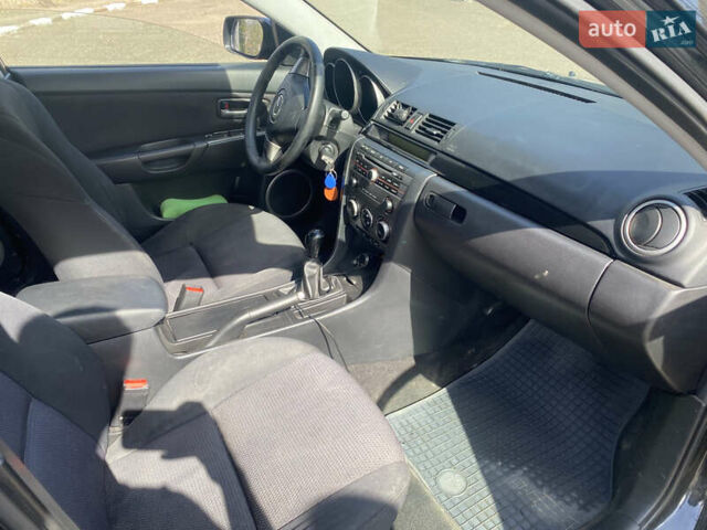 Черный Мазда 3, объемом двигателя 1.6 л и пробегом 255 тыс. км за 4600 $, фото 8 на Automoto.ua