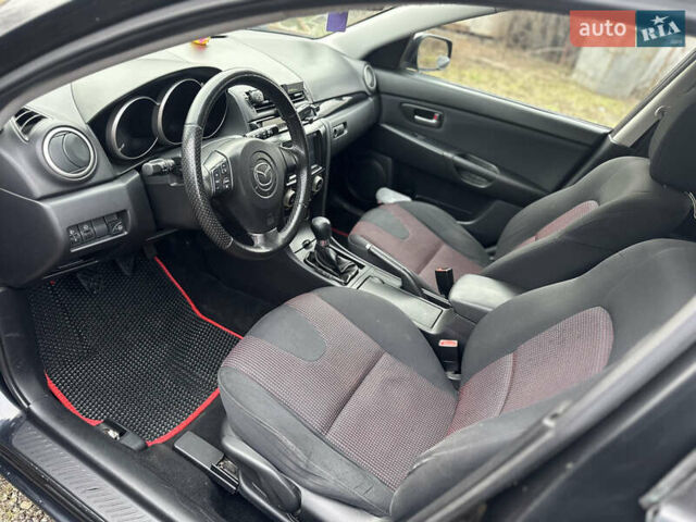 Чорний Мазда 3, об'ємом двигуна 1.6 л та пробігом 272 тис. км за 3999 $, фото 7 на Automoto.ua