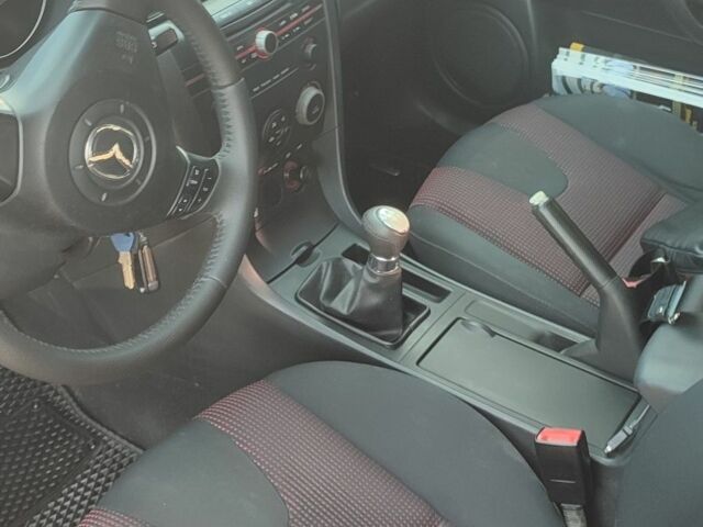 Черный Мазда 3, объемом двигателя 1.6 л и пробегом 316 тыс. км за 4300 $, фото 1 на Automoto.ua