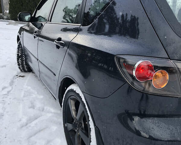 Черный Мазда 3, объемом двигателя 1.6 л и пробегом 296 тыс. км за 4499 $, фото 8 на Automoto.ua