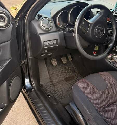 Черный Мазда 3, объемом двигателя 2 л и пробегом 338 тыс. км за 5500 $, фото 10 на Automoto.ua