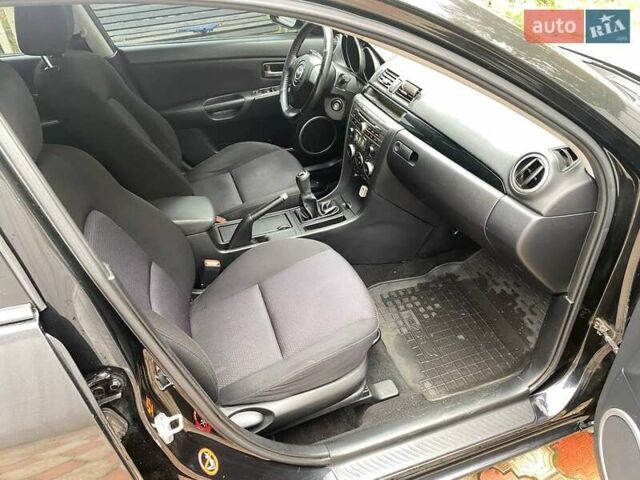 Мазда 3 2006 у Житомирі на Automoto.ua Чорний Мазда 3, об'ємом двигуна 1.6 л та пробігом 198 тис. км за 4400 $, фото 6 на Automoto.ua