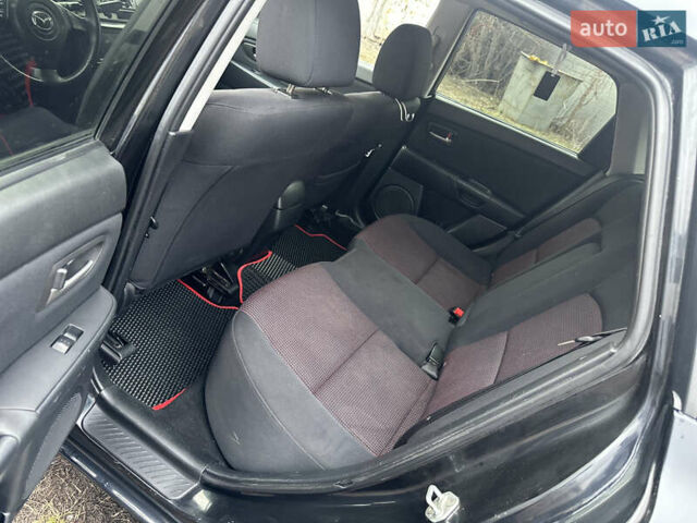 Чорний Мазда 3, об'ємом двигуна 1.6 л та пробігом 272 тис. км за 3999 $, фото 8 на Automoto.ua