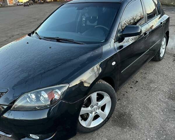 Черный Мазда 3, объемом двигателя 1.6 л и пробегом 199 тыс. км за 3700 $, фото 6 на Automoto.ua