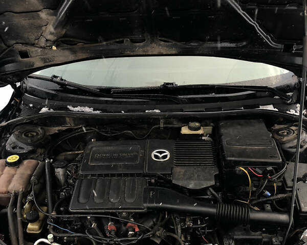Черный Мазда 3, объемом двигателя 1.6 л и пробегом 296 тыс. км за 4499 $, фото 19 на Automoto.ua