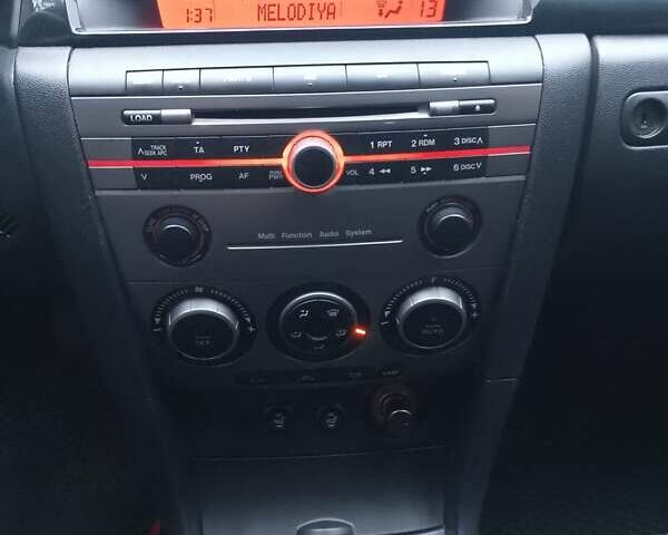 Чорний Мазда 3, об'ємом двигуна 1.6 л та пробігом 207 тис. км за 5200 $, фото 9 на Automoto.ua