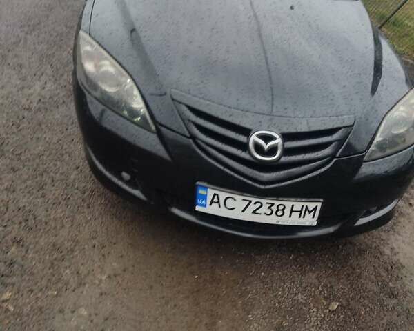 Черный Мазда 3, объемом двигателя 1.6 л и пробегом 285 тыс. км за 4000 $, фото 3 на Automoto.ua