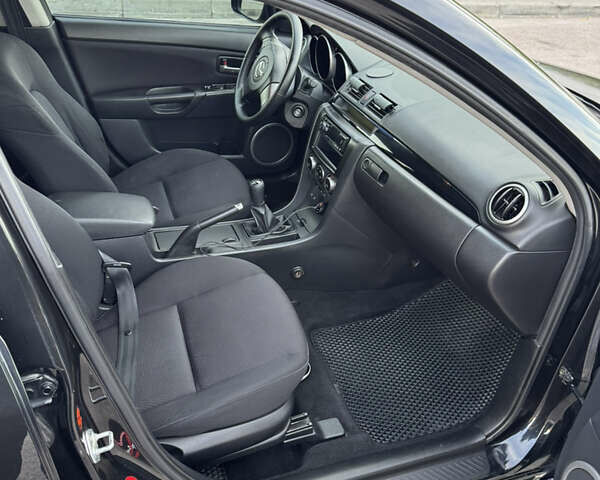 Чорний Мазда 3, об'ємом двигуна 1.6 л та пробігом 230 тис. км за 4500 $, фото 10 на Automoto.ua