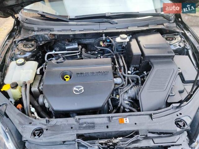 Черный Мазда 3, объемом двигателя 2 л и пробегом 110 тыс. км за 6500 $, фото 9 на Automoto.ua