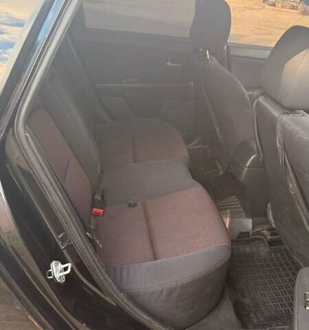 Черный Мазда 3, объемом двигателя 2 л и пробегом 338 тыс. км за 5500 $, фото 3 на Automoto.ua
