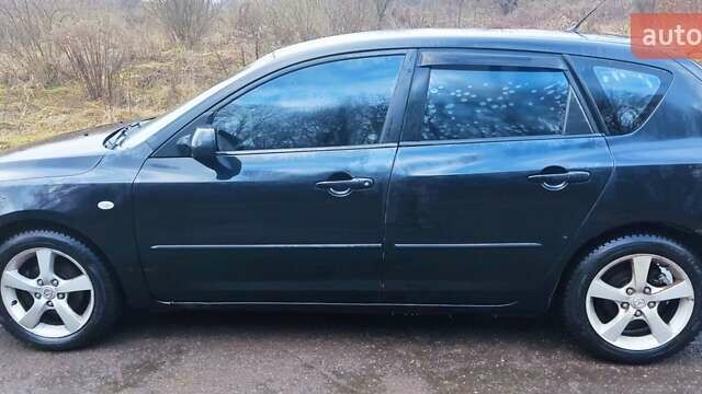 Черный Мазда 3, объемом двигателя 1.6 л и пробегом 260 тыс. км за 2800 $, фото 7 на Automoto.ua