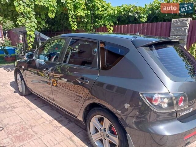 Чорний Мазда 3, об'ємом двигуна 1.6 л та пробігом 375 тис. км за 4500 $, фото 2 на Automoto.ua