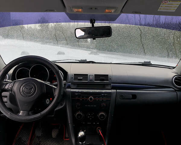 Черный Мазда 3, объемом двигателя 1.6 л и пробегом 296 тыс. км за 4499 $, фото 15 на Automoto.ua