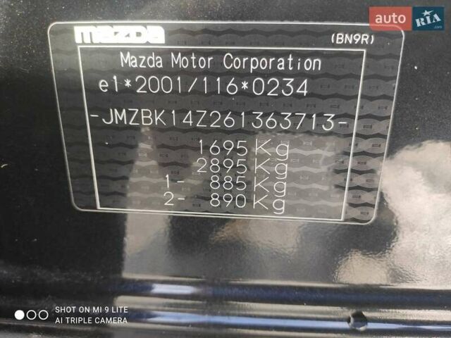 Черный Мазда 3, объемом двигателя 1.6 л и пробегом 286 тыс. км за 3750 $, фото 24 на Automoto.ua