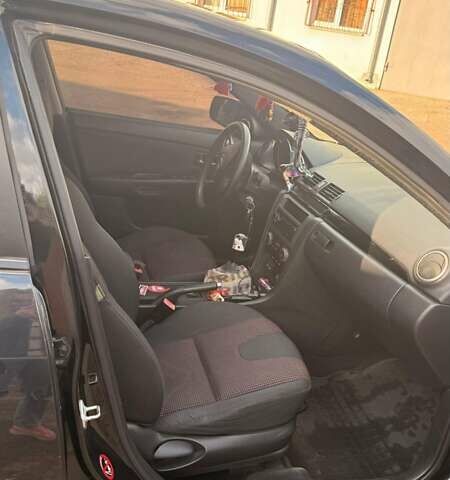 Черный Мазда 3, объемом двигателя 2 л и пробегом 338 тыс. км за 5500 $, фото 2 на Automoto.ua