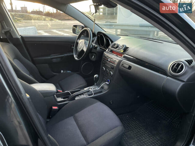Черный Мазда 3, объемом двигателя 1.6 л и пробегом 360 тыс. км за 4600 $, фото 21 на Automoto.ua