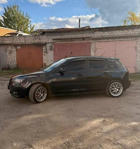 Черный Мазда 3, объемом двигателя 2 л и пробегом 338 тыс. км за 5500 $, фото 5 на Automoto.ua