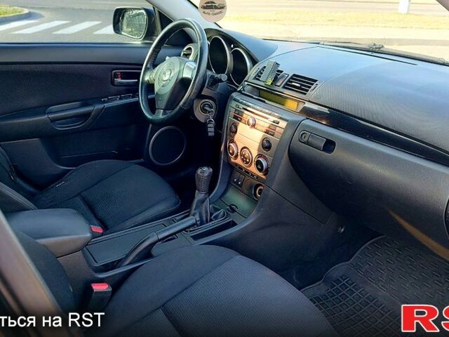 Черный Мазда 3, объемом двигателя 1.6 л и пробегом 331 тыс. км за 4500 $, фото 2 на Automoto.ua