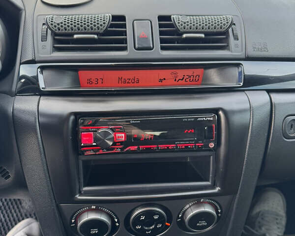 Чорний Мазда 3, об'ємом двигуна 1.6 л та пробігом 230 тис. км за 4500 $, фото 22 на Automoto.ua