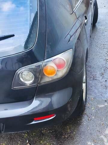 Черный Мазда 3, объемом двигателя 1.6 л и пробегом 260 тыс. км за 2800 $, фото 3 на Automoto.ua