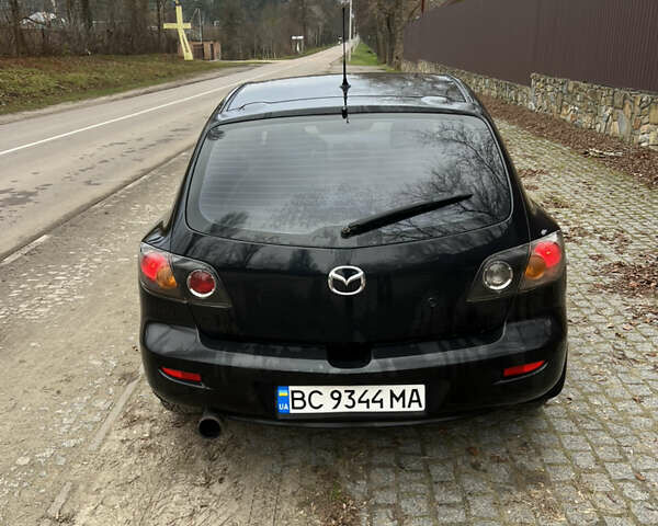 Черный Мазда 3, объемом двигателя 1.6 л и пробегом 260 тыс. км за 3250 $, фото 4 на Automoto.ua