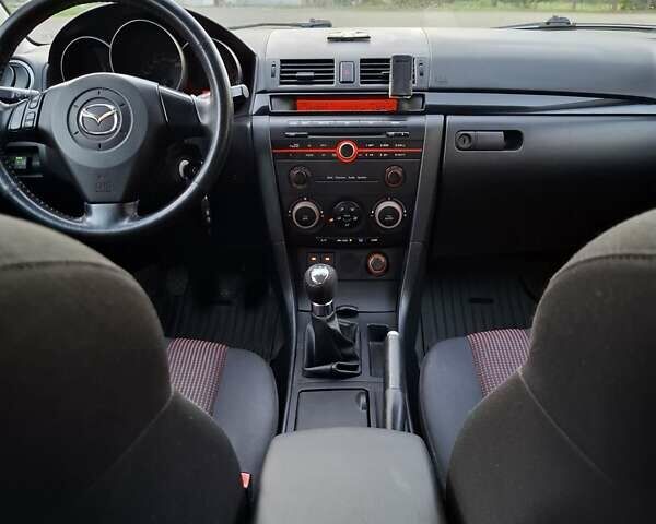 Черный Мазда 3, объемом двигателя 1.6 л и пробегом 193 тыс. км за 4999 $, фото 13 на Automoto.ua