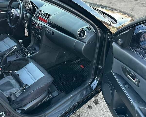 Черный Мазда 3, объемом двигателя 1.6 л и пробегом 199 тыс. км за 3700 $, фото 1 на Automoto.ua