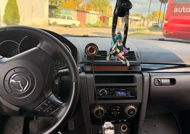 Черный Мазда 3, объемом двигателя 2 л и пробегом 338 тыс. км за 5500 $, фото 1 на Automoto.ua