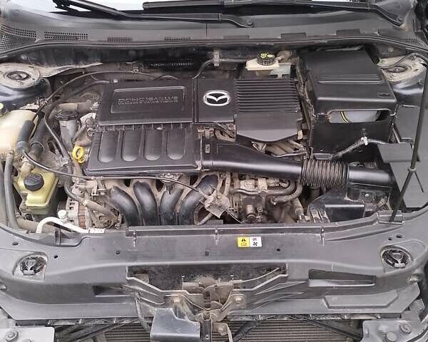 Чорний Мазда 3, об'ємом двигуна 1.6 л та пробігом 207 тис. км за 5200 $, фото 4 на Automoto.ua