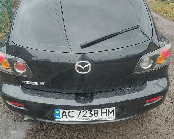 Черный Мазда 3, объемом двигателя 1.6 л и пробегом 285 тыс. км за 4000 $, фото 1 на Automoto.ua