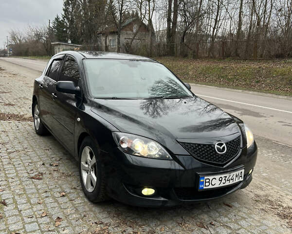 Черный Мазда 3, объемом двигателя 1.6 л и пробегом 260 тыс. км за 3250 $, фото 2 на Automoto.ua